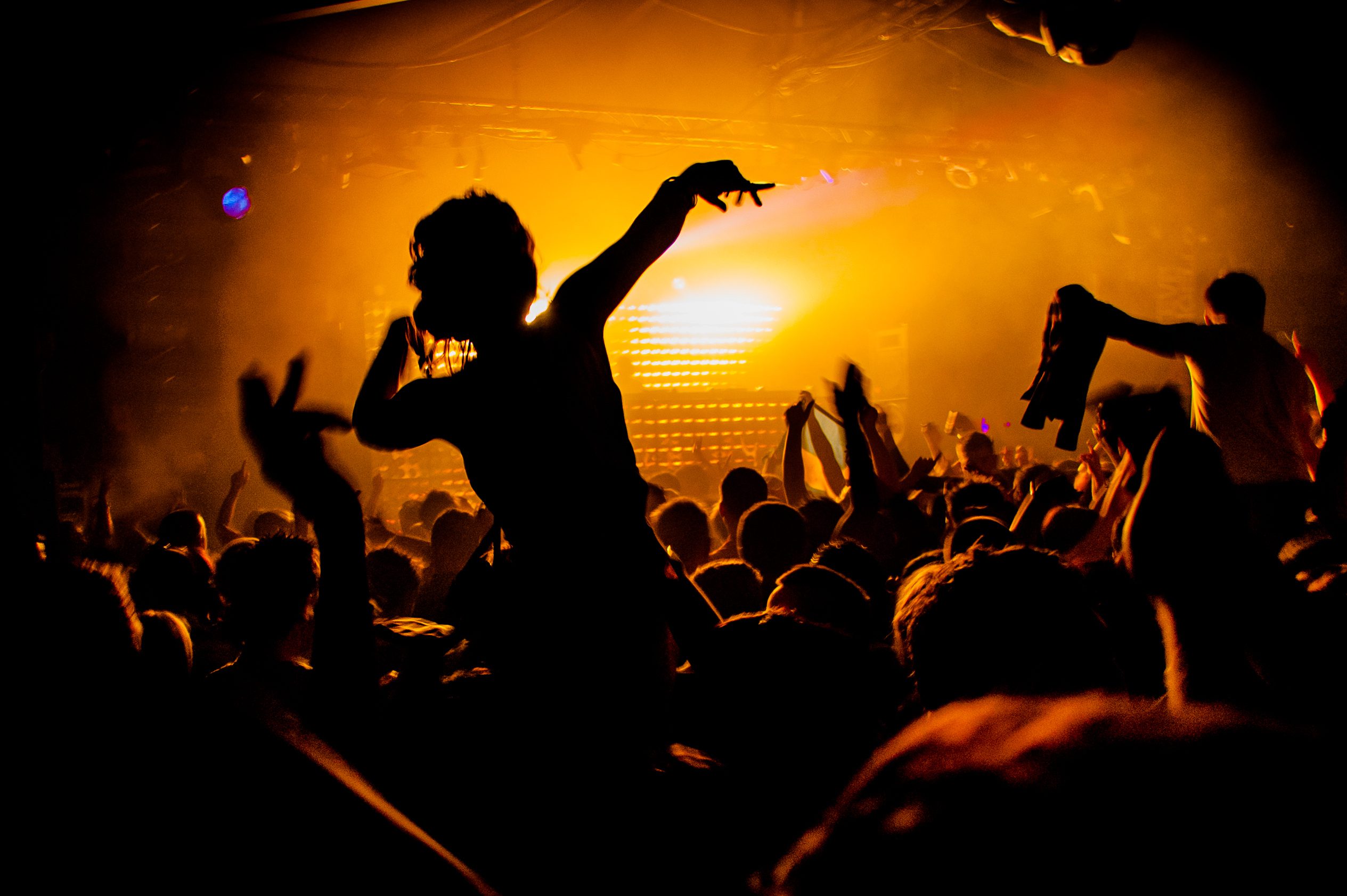 dancing in a nightclub, possibly in MExico for Cinco de Mayo